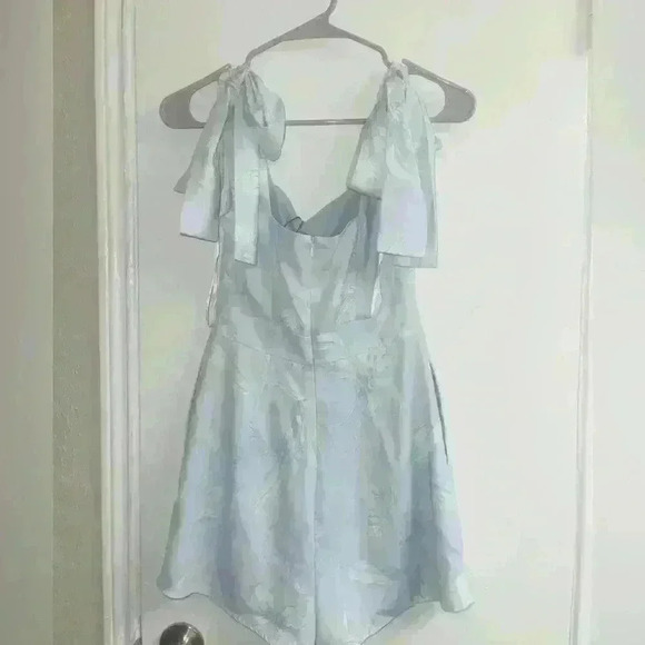 Electra Tie Shoulder Romper in Floral Flutter
by Love, Bonito size XS NWT - Picture 6 of 12